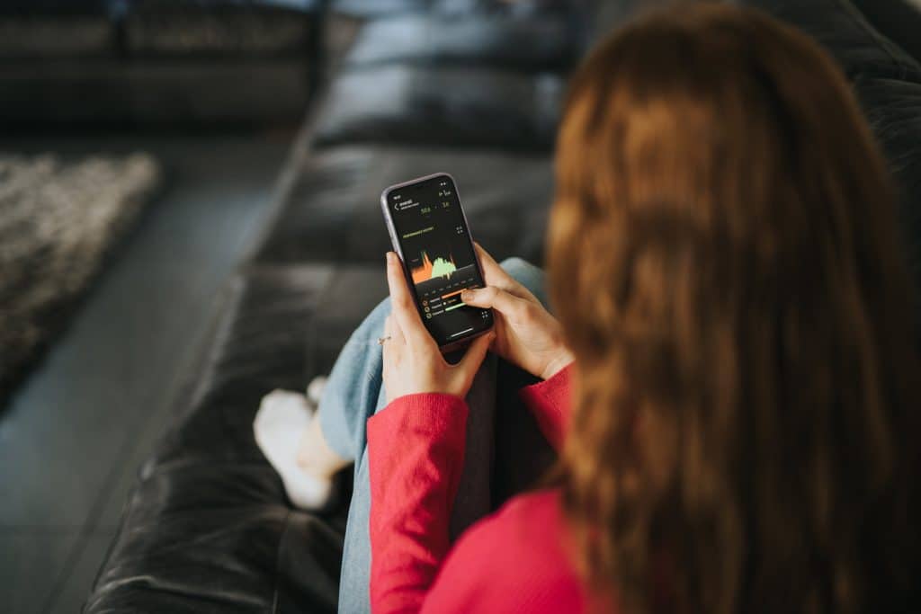 woman using myenergi app